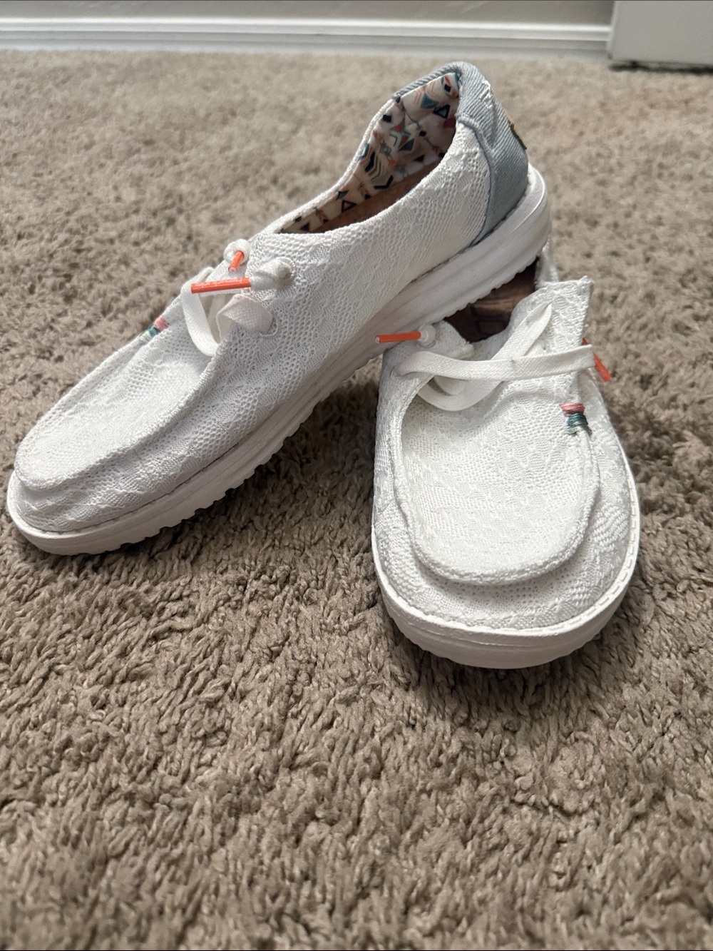 Hey Dude White Slip-On Canvas Sneakers with Subtle Coral Accents